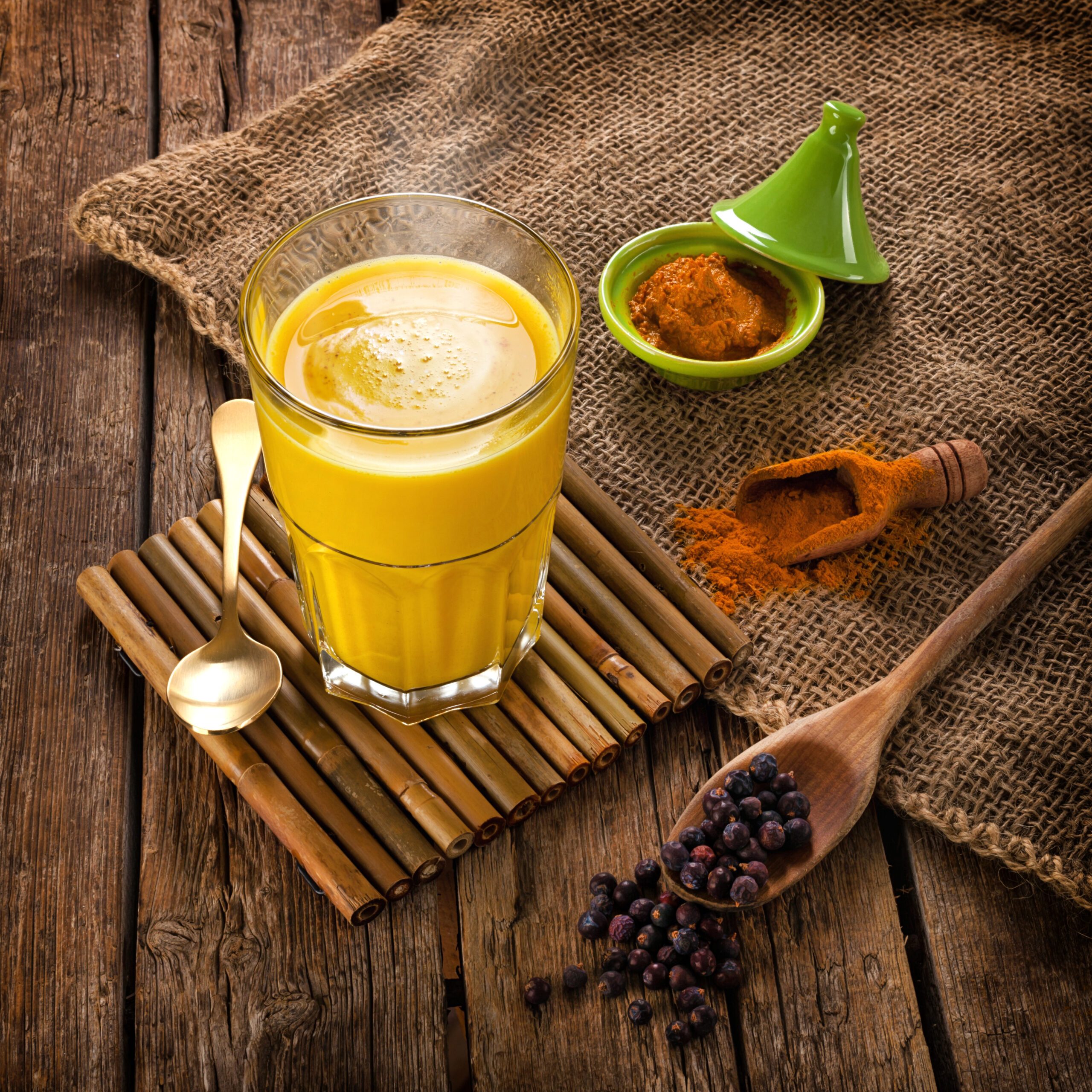 Glass of golden milk made with turmeric