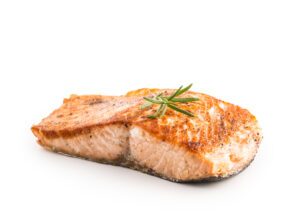 Roasted salmon steak isolated on a white background