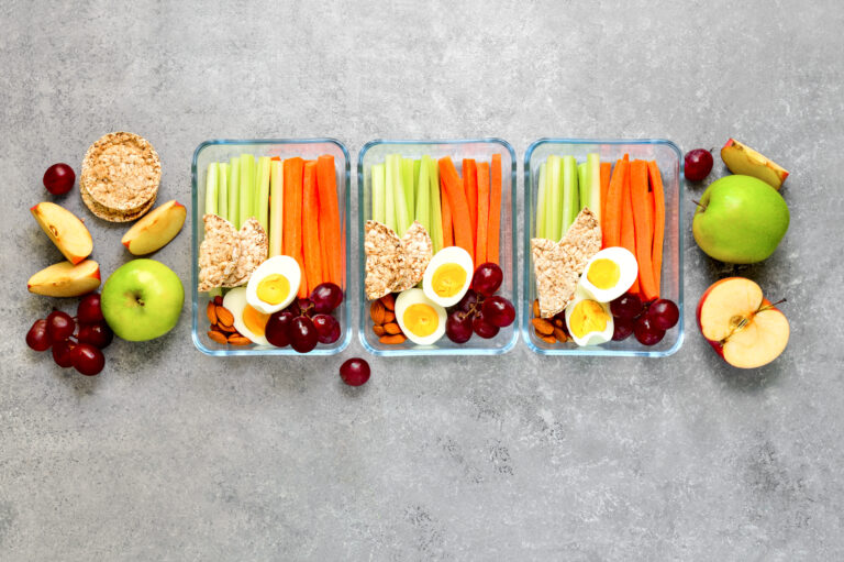 Lunch boxes with healthy snacks, healthy food concept, view from above, blank space for a text